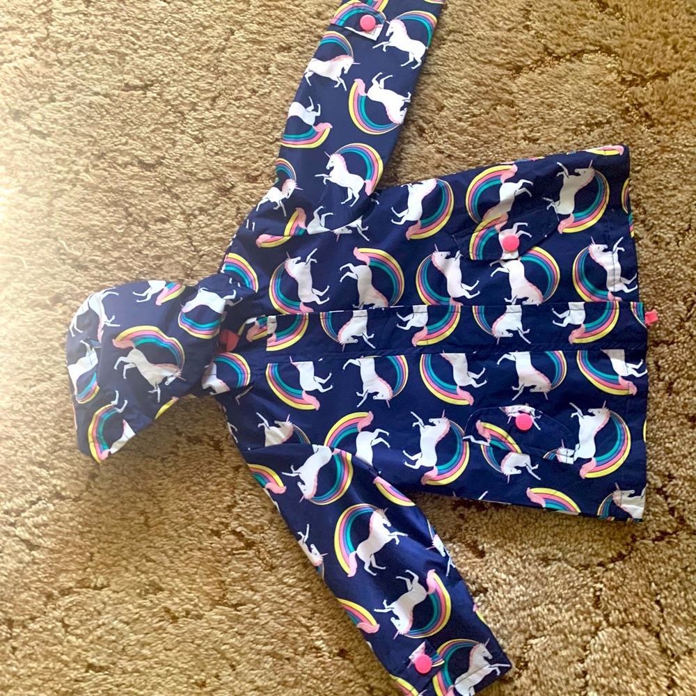 Adorable Carter’s unicorn lined rain/wind jacket.